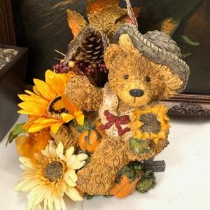 Ceramic sunflower teddy bear in a wheelbarrow